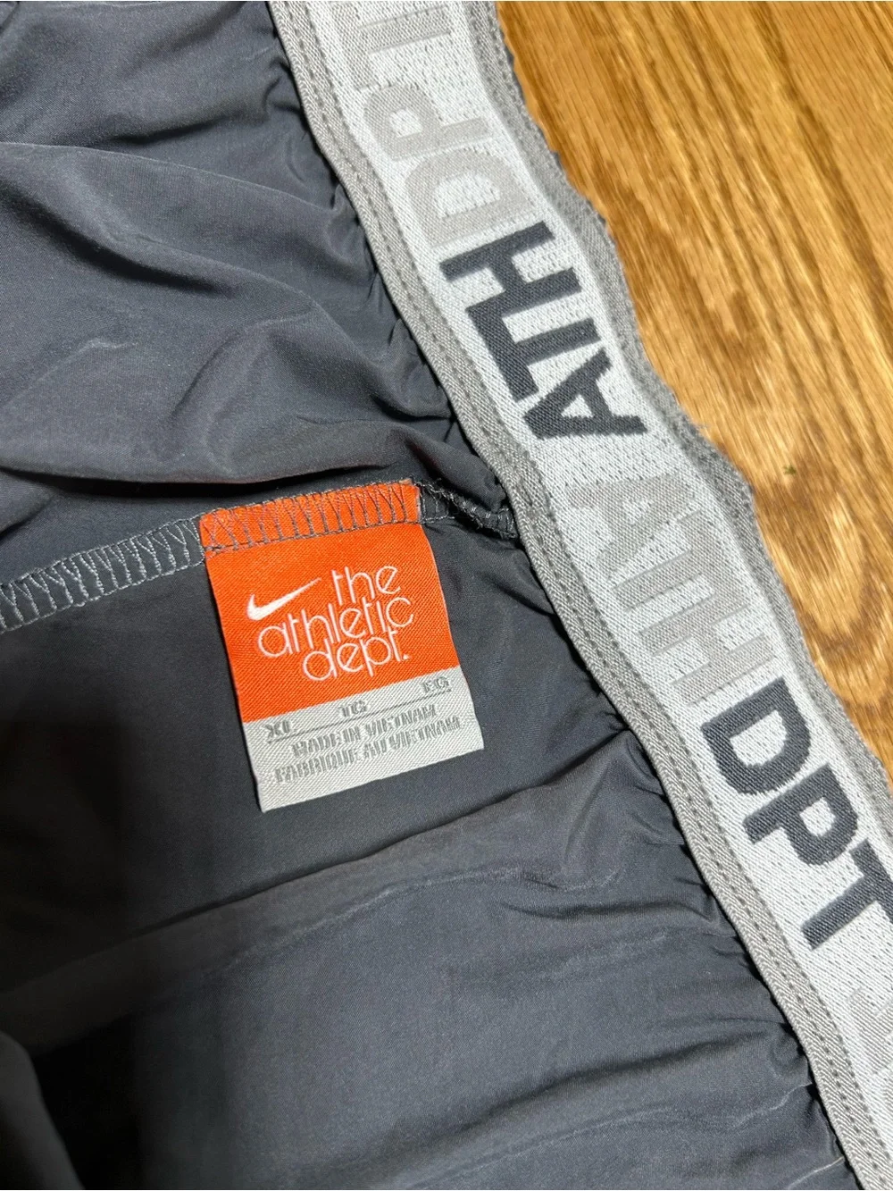 Women’s Nike the athletic dept Track Capris Grey with White Size XL